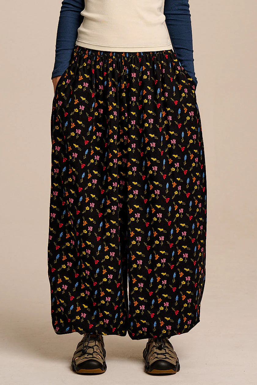 Renata - Cuffed Cotton Balloon Leg Trouser in Mini Tulips on Black - Image 5